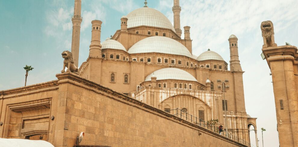 A bustling scene at the historic Mosque of Muhammad Ali in Cairo, Egypt.