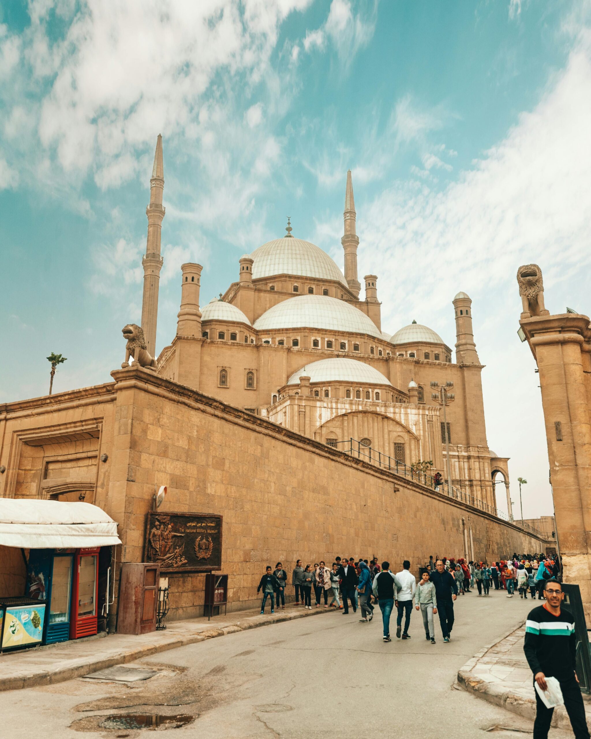 A bustling scene at the historic Mosque of Muhammad Ali in Cairo, Egypt.